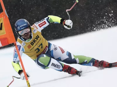 Slovenia's Miha Hrobat speeds down the course during an alpine ski, men's World Cup super G, in Crans Montana, Switzerland, Sunday, Feb. 23 2025. (AP Photo/Gabriele Facciotti)