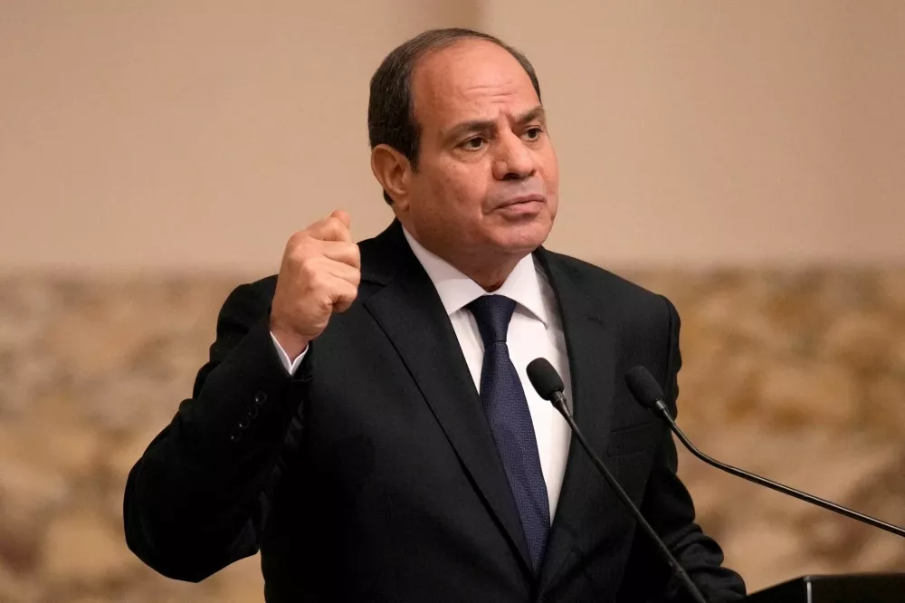 FILE PHOTO: Egyptian President Abdel Fattah el-Sisi gestures during a joint press conference with French President Emmanuel Macron in Cairo, Egypt, Wednesday, Oct. 25, 2023. Christophe Ena/Pool via REUTERS/File Photo