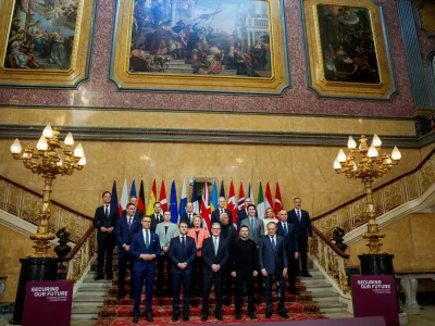 Britain's Prime Minister Keir Starmer, President Volodymyr Zelenskiy, Germany's Chancellor Olaf Scholz, Norway's Prime Minister Jonas Gahr Store, European Commission President Ursula von der Leyen, European Council President Antonio Costa, France's President Emmanuel Macron, Canada's Prime Minister Justin Trudeau, Czech Republic's Prime Minister Petr Fiala, Dutch Prime Minister Dick Schoof, Romania's Interim President Ilie Bolojan, Turkey's Minister of Foreign Affairs Hakan Fidan, Denmark's Prime Minister Mette Frederiksen, Sweden's Prime Minister Ulf Kristersson, Finland's President Alexander Stubb, Italy's Prime Minister Giorgia Meloni, Spain's Prime Minister Pedro Sanchez, Poland's Prime Minister Donald Tusk and NATO Secretary General Mark Rutte attend the European leaders' summit to discuss European security and Ukraine, at Lancaster House in London, Britain, March 2, 2025. NTB/Javad Parsa/via REUTERS  ATTENTION EDITORS - THIS IMAGE WAS PROVIDED BY A THIRD PARTY. NORWAY OUT. NO COMMERCIAL OR EDITORIAL SALES IN NORWAY.