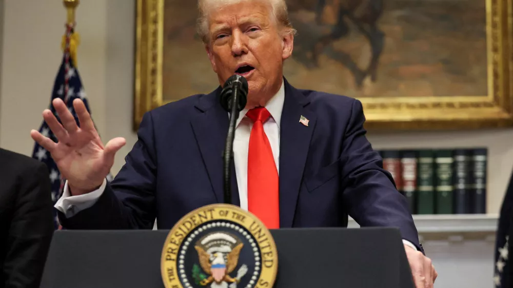 FILE PHOTO: U.S. President Donald Trump makes an announcement about an investment from Taiwan Semiconductor Manufacturing Company (TSMC), in the Roosevelt Room at the White House in Washington, D.C., U.S., March 3, 2025. REUTERS/Leah Millis/File Photo