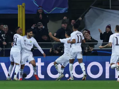 Soccer Football - Champions League - Round of 16 - First Leg - Club Brugge v Aston Villa - Jan Breydel Stadium, Bruges, Belgium - March 4, 2025 Aston Villa's Marco Asensio celebrates scoring their third goal with teammates REUTERS/Yves Herman