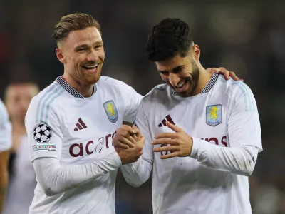Soccer Football - Champions League - Round of 16 - First Leg - Club Brugge v Aston Villa - Jan Breydel Stadium, Bruges, Belgium - March 4, 2025 Aston Villa's Matty Cash and Aston Villa's Marco Asensio celebrate after the match Action Images via Reuters/Paul Childs