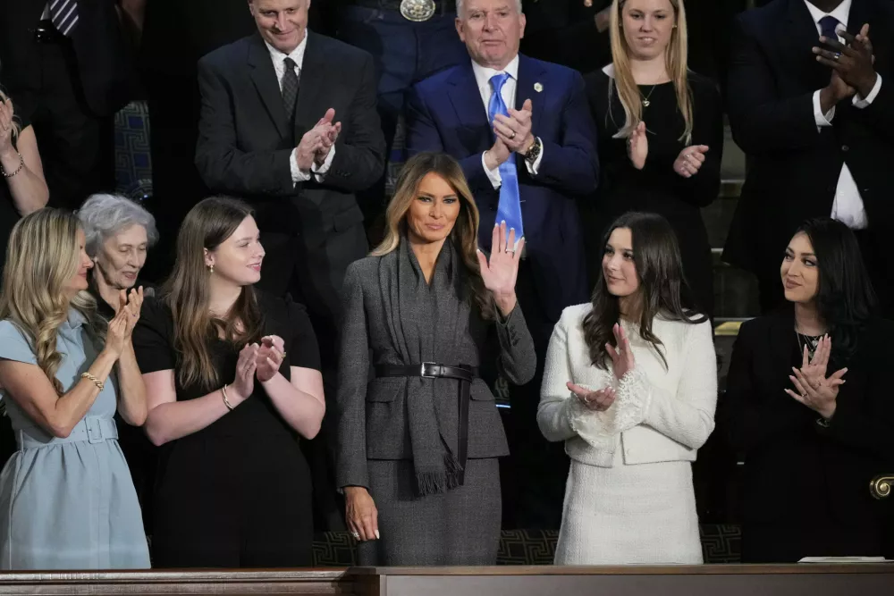 First lady Melania Trump arrives in the House Chamber before President Donald Trump arrives to address a joint session of Congress at the Capitol in Washington, Tuesday, March 4, 2025. (AP Photo/J. Scott Applewhite)