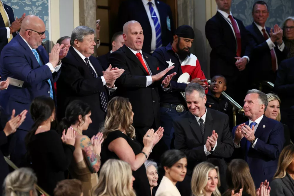 Jeff Denard applauds on the day of U.S. President Donald Trump's speech to a joint session of Congress, in the House Chamber of the U.S. Capitol in Washington, D.C., U.S., March 4, 2025. REUTERS/Evelyn Hockstein