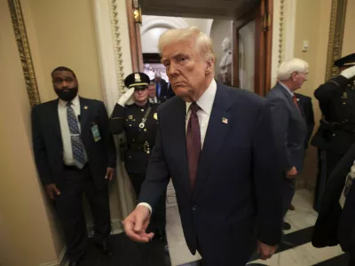 President Donald Trump leaves the chamber after addressing a joint session of Congress at the Capitol in Washington, Tuesday, March 4, 2025. (Win McNamee/Pool Photo via AP)