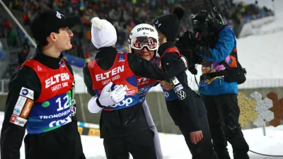 Nordic Skiing - FIS Nordic World Ski Championships - Trondheim, Norway - March 5, 2025 Slovenia's Anze Lanisek and Slovenia's Domen Prevc react during the mixed team large hill HS138 second round REUTERS/Kai Pfaffenbach