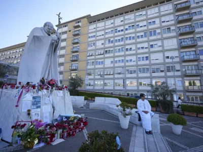 A man prays for Pope Francis in front of the Agostino Gemelli Polyclinic, in Rome, Thursday, March 6, 2025, where the Pontiff is hospitalized since Feb. 14. (AP Photo/Andrew Medichini)