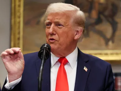 FILE PHOTO: U.S. President Donald Trump makes an announcement about an investment from Taiwan Semiconductor Manufacturing Company (TSMC), in the Roosevelt Room at the White House in Washington, D.C., U.S., March 3, 2025. REUTERS/Leah Millis/File Photo