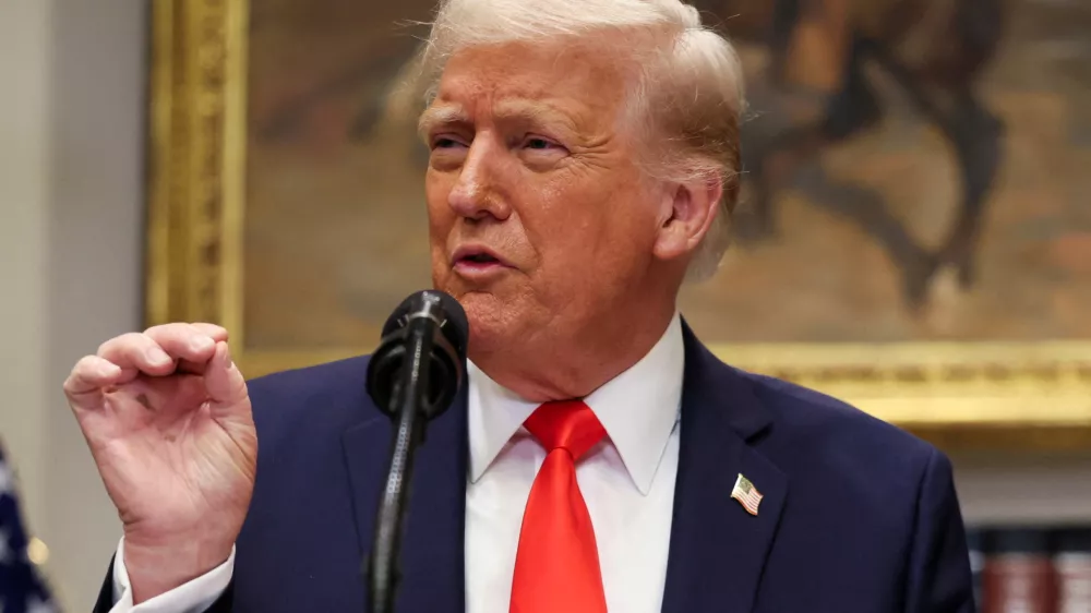 FILE PHOTO: U.S. President Donald Trump makes an announcement about an investment from Taiwan Semiconductor Manufacturing Company (TSMC), in the Roosevelt Room at the White House in Washington, D.C., U.S., March 3, 2025. REUTERS/Leah Millis/File Photo