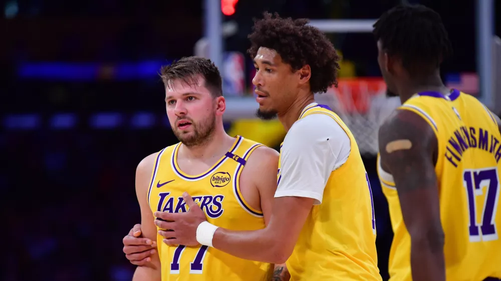 Mar 6, 2025; Los Angeles, California, USA; Los Angeles Lakers guard Luka Doncic (77) reacts after beiing issued a technical foul against the New York Knicks during the first half at Crypto.com Arena. Mandatory Credit: Gary A. Vasquez-Imagn Images