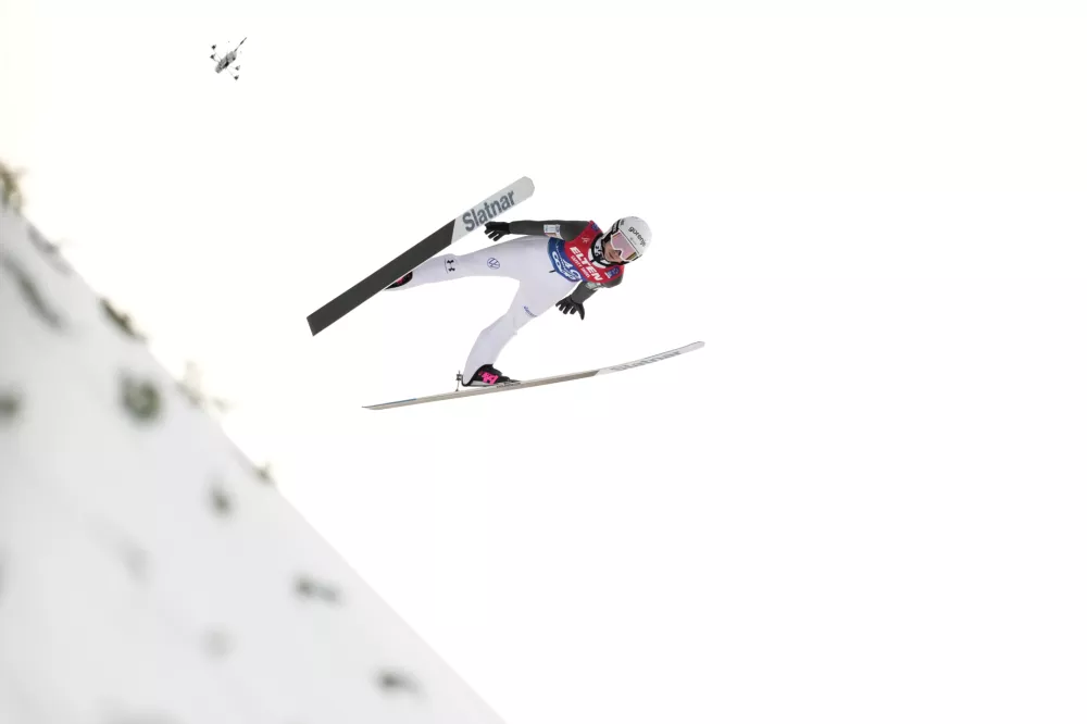 Nika Prevc, of Slovenia, soars through the air during her first round jump of the ski jumping women's large hill individual competition at the Nordic World Ski Championships in Trondheim, Norway, Friday, March 7, 2025. (AP Photo/Matthias Schrader)