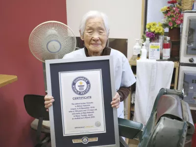 Shitsui Hakoishi, 108, poses for a photo with a Guiness World Records certificate recognizing her as the world's oldest female barber, at her shop in Nakagawa in Tochigi Prefecture, eastern Japan, on March 5, 2025.,Image: 972584007, License: Rights-managed, Restrictions:, Model Release: no