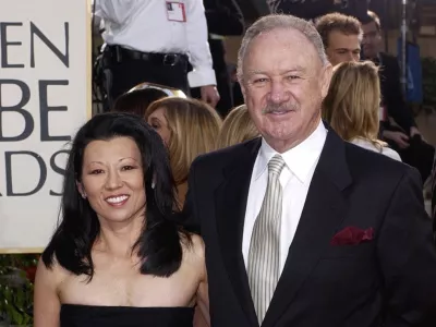 FILE - Actor Gene Hackman arrives with his wife, Betsy Arakawa, for the 60th Annual Golden Globe Awards in Beverly Hills, Calif., Sunday, Jan. 19, 2003. (AP Photo/Mark J. Terrill, File)