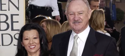 FILE - Actor Gene Hackman arrives with his wife, Betsy Arakawa, for the 60th Annual Golden Globe Awards in Beverly Hills, Calif., Sunday, Jan. 19, 2003. (AP Photo/Mark J. Terrill, File)