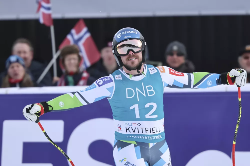 Slovenia's Miha Hrobat reacts after completing an alpine ski, men's World Cup downhill, in Kvitfjell, Norway, Saturday, March 8, 2025. (AP Photo/Marco Trovati)