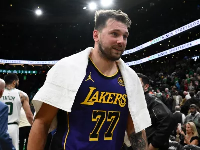 Mar 8, 2025; Boston, Massachusetts, USA; Los Angeles Lakers guard Luka Doncic (77) walks off of the court after a game against the Boston Celtics at the TD Garden. Mandatory Credit: Brian Fluharty-Imagn Images