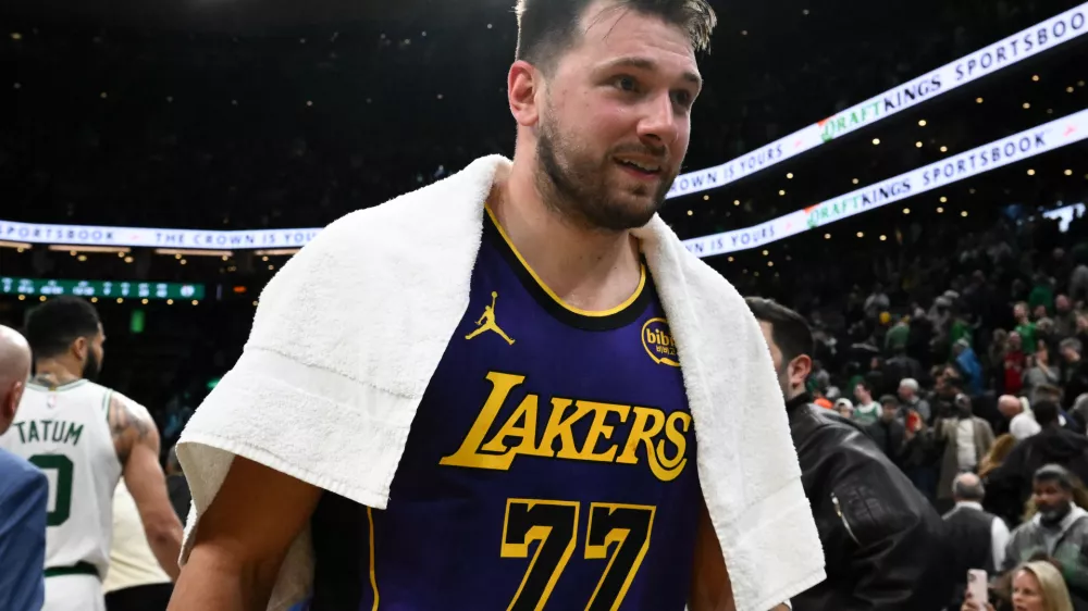 Mar 8, 2025; Boston, Massachusetts, USA; Los Angeles Lakers guard Luka Doncic (77) walks off of the court after a game against the Boston Celtics at the TD Garden. Mandatory Credit: Brian Fluharty-Imagn Images