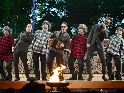 The music group KAJ performs the song 'Bara bada bastu' during the final of the Melodifestivalen song contest at Strawberry Arena in Stockholm, Sweden, Saturday, March 8, 2025. (Anders Wiklund/TT News Agency via AP)