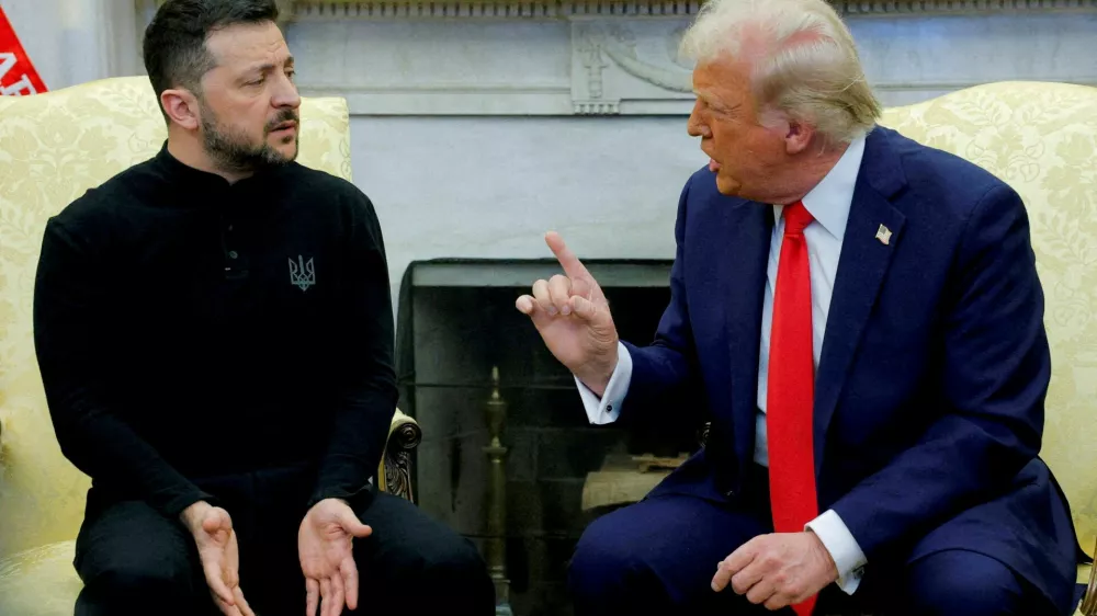 FILE PHOTO: U.S. President Donald Trump meets with Ukrainian President Volodymyr Zelenskiy at the White House in Washington, D.C., February 28, 2025. REUTERS/Brian Snyder/File Photo