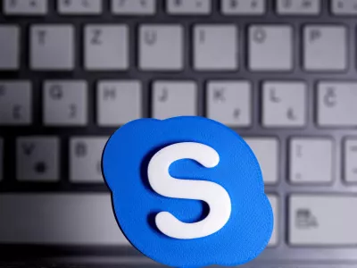 FILE PHOTO: A 3D printed Skype logo is placed in front of a keyboard in this illustration taken April 12, 2020. REUTERS/Dado Ruvic/Illustration/File Photo