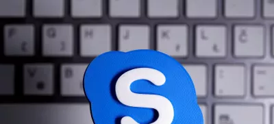 FILE PHOTO: A 3D printed Skype logo is placed in front of a keyboard in this illustration taken April 12, 2020. REUTERS/Dado Ruvic/Illustration/File Photo