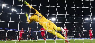 Soccer Football - Champions League - Round of 16 - First Leg - Paris St Germain v Liverpool - Parc des Princes, Paris, France - March 5, 2025 Liverpool's Alisson Becker makes a save REUTERS/Gonzalo Fuentes