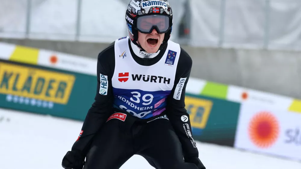 Nordic Skiing - FIS Nordic World Ski Championships - Trondheim, Norway - March 8, 2025 Norway's Marius Lindvik celebrates finishing second in the men's large hill second round REUTERS/Kai Pfaffenbach