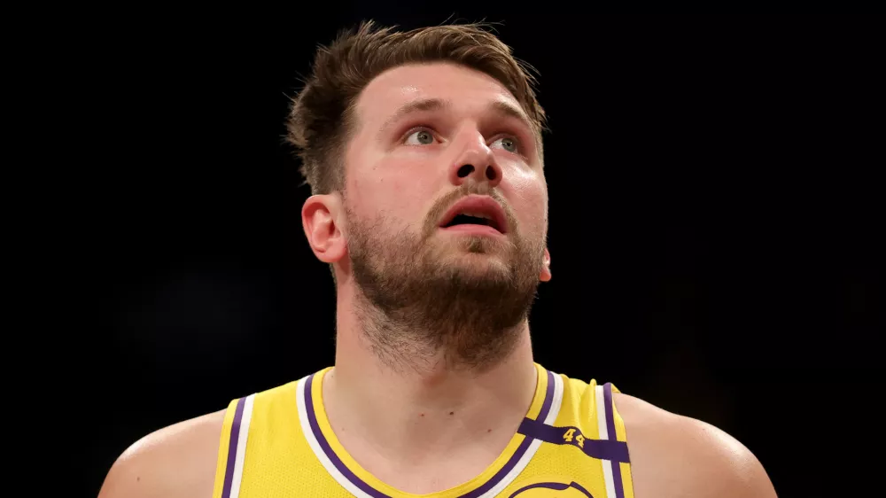 Mar 10, 2025; Brooklyn, New York, USA; Los Angeles Lakers guard Luka Doncic (77) reacts during the third quarter against the Brooklyn Nets at Barclays Center. Mandatory Credit: Brad Penner-Imagn Images