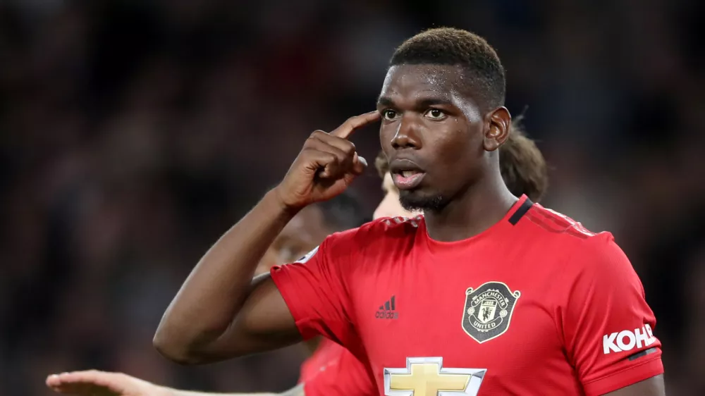﻿Soccer Football - Premier League - Wolverhampton Wanderers v Manchester United - Molineux Stadium, Wolverhampton, Britain - August 19, 2019  Manchester United's Paul Pogba reacts after Wolverhampton Wanderers' first goal  Action Images via Reuters/Carl Recine  EDITORIAL USE ONLY. No use with unauthorized audio, video, data, fixture lists, club/league logos or "live" services. Online in-match use limited to 75 images, no video emulation. No use in betting, games or single club/league/player publications. Please contact your account representative for further details.