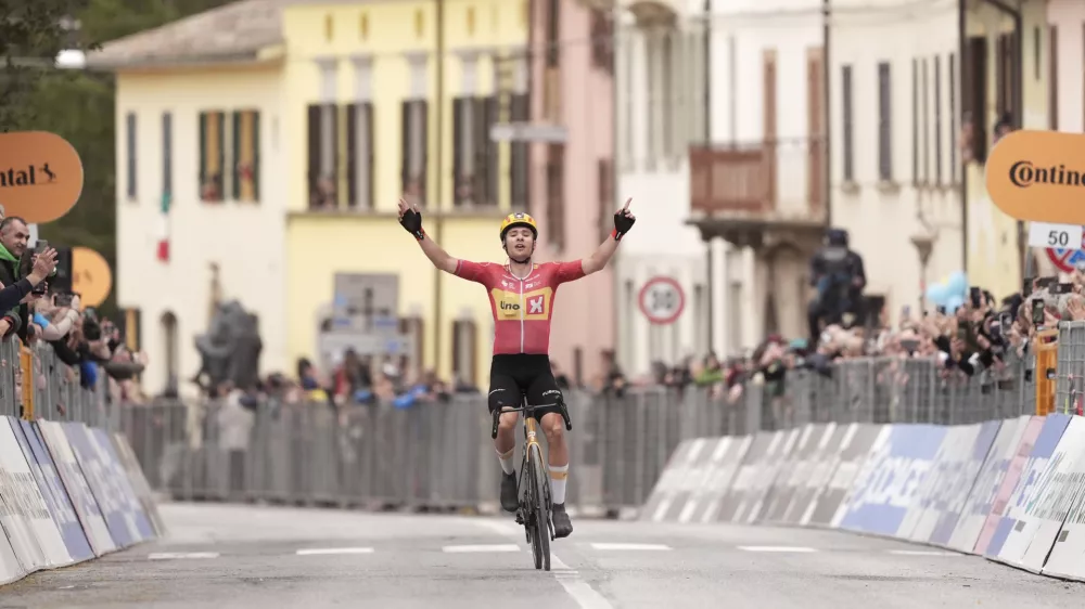 Fredrik Dversnes of Uno-X Mobility celebrates winning the stage, Stage 5 from Ascoli Piceno to Pergola during the 60th Tirreno - Adriatico cycling race, in Pergola, Italy, Friday March 14, 2025. (Massimo Paolone/LaPresse via AP)