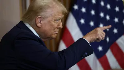 U.S. President Donald Trump points as he attends the annual Friends of Ireland luncheon hosted by U.S. House of Representatives Speaker Mike Johnson (R-LA) at the U.S. Capitol in Washington, D.C., U.S., March 12, 2025. REUTERS/Evelyn Hockstein