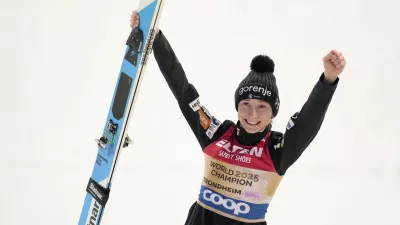 Nika Prevc, of Slovenia, celebrates after winning the gold medal in the ski jumping women's large hill individual competition at the Nordic World Ski Championships in Trondheim, Norway, Friday, March 7, 2025. (AP Photo/Matthias Schrader)