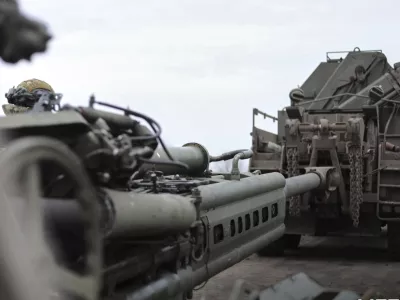 In this photo distributed by Russian Defense Ministry Press Service on Saturday, March 15, 2025, a destroyed Ukrainian Army M777 howitzer, left, is transported at Cherkasskoe Porechnoe and Pravda in Sudzha district of the Kursk region of Russia after it was taken over by Russian troops. (Russian Defense Ministry Press Service via AP)