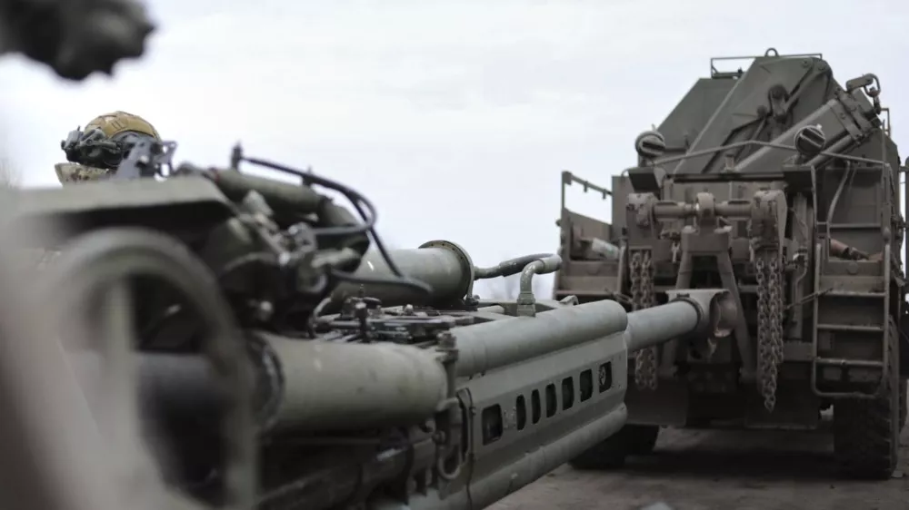 In this photo distributed by Russian Defense Ministry Press Service on Saturday, March 15, 2025, a destroyed Ukrainian Army M777 howitzer, left, is transported at Cherkasskoe Porechnoe and Pravda in Sudzha district of the Kursk region of Russia after it was taken over by Russian troops. (Russian Defense Ministry Press Service via AP)