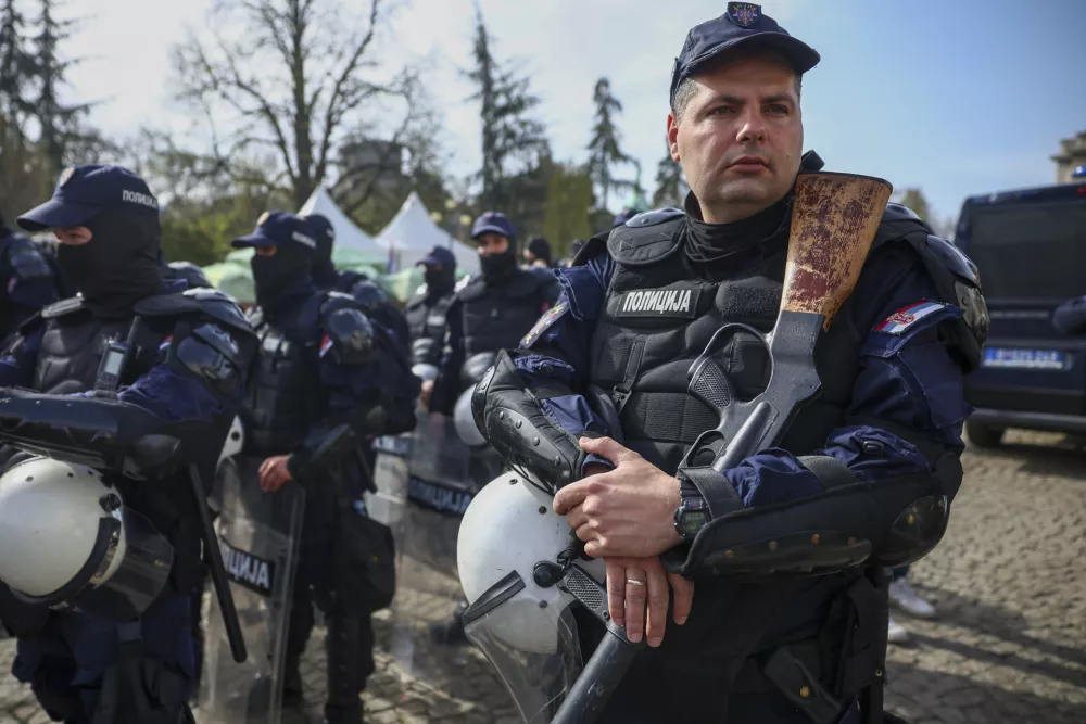 Police officers stand guard prior to a an anti-corruption rally in Belgrade, Serbia, Saturday, March 15, 2025. (AP Photo/Armin Durgut)