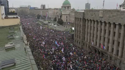 Tens of thousands gather in front of the Serbian parliament during a major anti-corruption rally led by university students in Belgrade, Serbia, Saturday, March 15, 2025. (AP Photo/Marko Drobnjakovic)