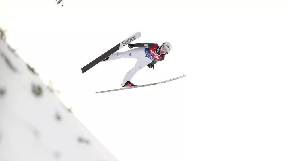 Nika Prevc, of Slovenia, soars through the air during her first round jump of the ski jumping women's large hill individual competition at the Nordic World Ski Championships in Trondheim, Norway, Friday, March 7, 2025. (AP Photo/Matthias Schrader)