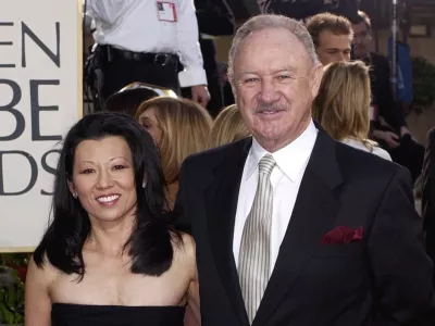 FILE - Actor Gene Hackman arrives with his wife, Betsy Arakawa, for the 60th Annual Golden Globe Awards in Beverly Hills, Calif., Sunday, Jan. 19, 2003. (AP Photo/Mark J. Terrill, File)