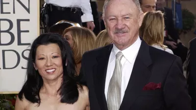 FILE - Actor Gene Hackman arrives with his wife, Betsy Arakawa, for the 60th Annual Golden Globe Awards in Beverly Hills, Calif., Sunday, Jan. 19, 2003. (AP Photo/Mark J. Terrill, File)