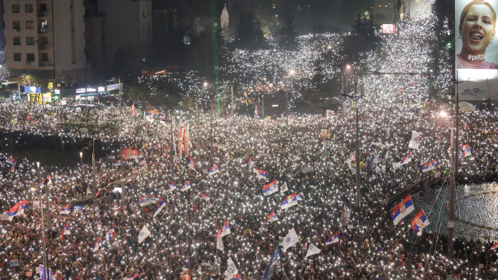 Students and anti-government demonstrators light the flashlights of their mobile phones during a protest, which has become a national movement for change following the deadly November 2024 Novi Sad railway station roof collapse, in Belgrade, Serbia, March 15, 2025. REUTERS/Igor Pavicevic