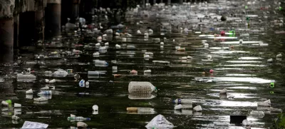 FILE PHOTO: Plastic bottles float on the heavily polluted San Juan River, a tributary of Pasig River in Mandaluyong City, Philippines, June 21, 2021. REUTERS/Eloisa Lopez