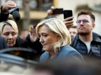 French far-right leader Marine Le Pen, member of parliament from the Rassemblement National (National Rally - RN) party, leaves the party's headquarters on the day of the verdict of the trial of her alongside 24 other defendants (party officials and employees, former lawmakers and parliamentary assistants) and the RN party itself, over accusations of misappropriation of European Union funds, in Paris, France, March 31, 2025. REUTERS/Abdul Saboor 