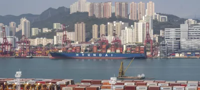 Container ships are docked at Kwai Chung Container terminal in Hong Kong, Tuesday, Apr. 8, 2025. (AP Photo/Chan Long Hei)