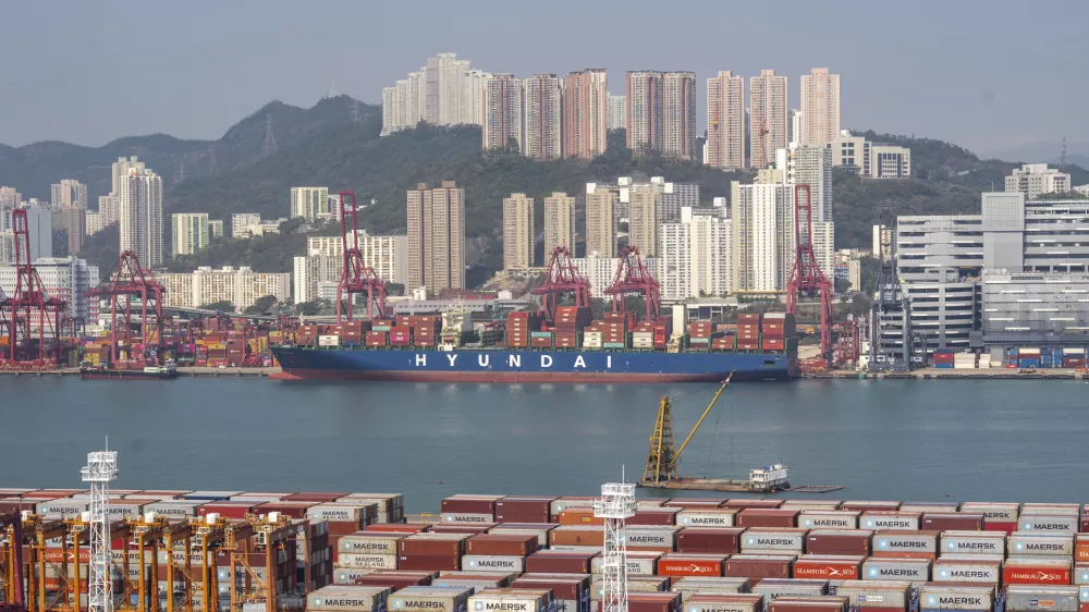 Container ships are docked at Kwai Chung Container terminal in Hong Kong, Tuesday, Apr. 8, 2025. (AP Photo/Chan Long Hei)