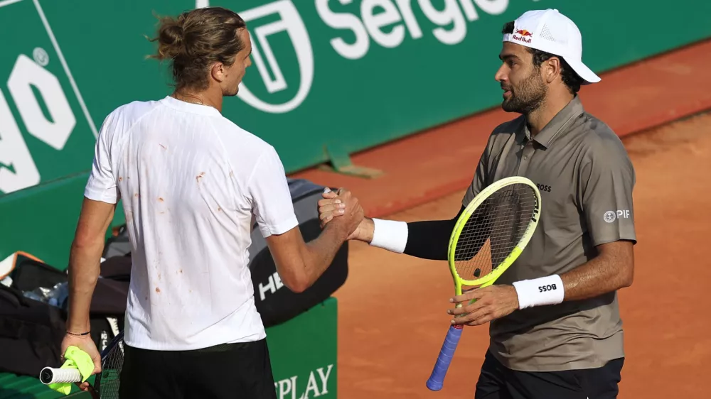 Tennis - ATP Masters 1000 - Monte Carlo Masters - Monte Carlo Country Club, Roquebrune-Cap-Martin, France - April 8, 2025 Italy's Matteo Berrettini shakes hands with Germany's Alexander Zverev after winning his round of 64 match REUTERS/Manon Cruz