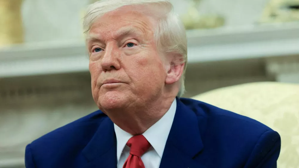 FILE PHOTO: U.S. President Donald Trump looks on during a meeting with Israeli Prime Minister Benjamin Netanyahu (not pictured) in the Oval Office at the White House in Washington, U.S., April 7, 2025. REUTERS/Kevin Mohatt/File Photo