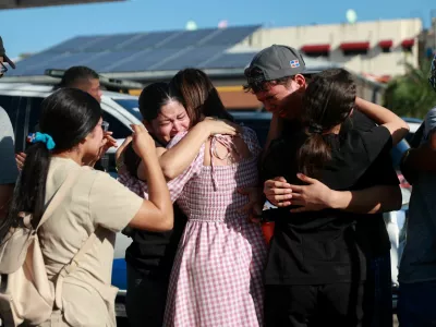 People react at the site where the roof of the Jet Set nightclub collapsed, in Santo Domingo, Dominican Republic, April 8, 2025. REUTERS/Erika Santelices   TPX IMAGES OF THE DAY