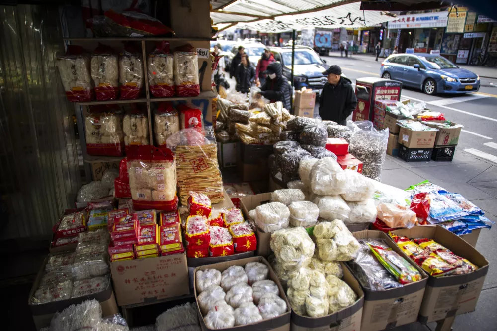 Chinese imports are displayed for sale at a dried noodles shop, at Chinatown in New York, Tuesday, April 8, 2025. (AP Photo/Eduardo Munoz Alvarez)