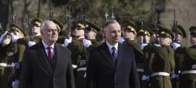 Estonian President Alar Karis, left, and Poland's President Andrzej Duda review the honor guard during their meeting at Kadriorg Palace in Tallinn, Estonia, Tuesday, April 8, 2025. (AP Photo/Sergei Grits)