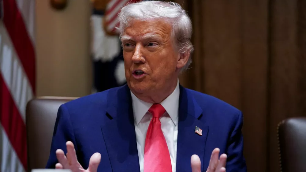 U.S. President Donald Trump attends a cabinet meeting at the White House in Washington, D.C., U.S., April 10, 2025. REUTERS/Nathan Howard